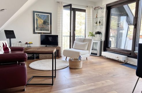 Wohnzimmer mit Ausgang zur Loggia