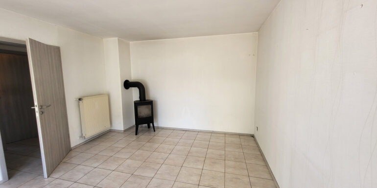 Wohnzimmer mit Kamin EG