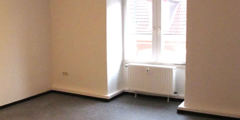 Eines der Zimmer mit hohen Decken